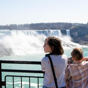 tourists-them-back-camera-looking-into-tower-view_399963-45693